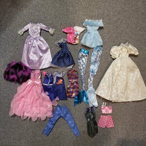 Assorted Barbie clothes. Dresses, outfits, mermaid